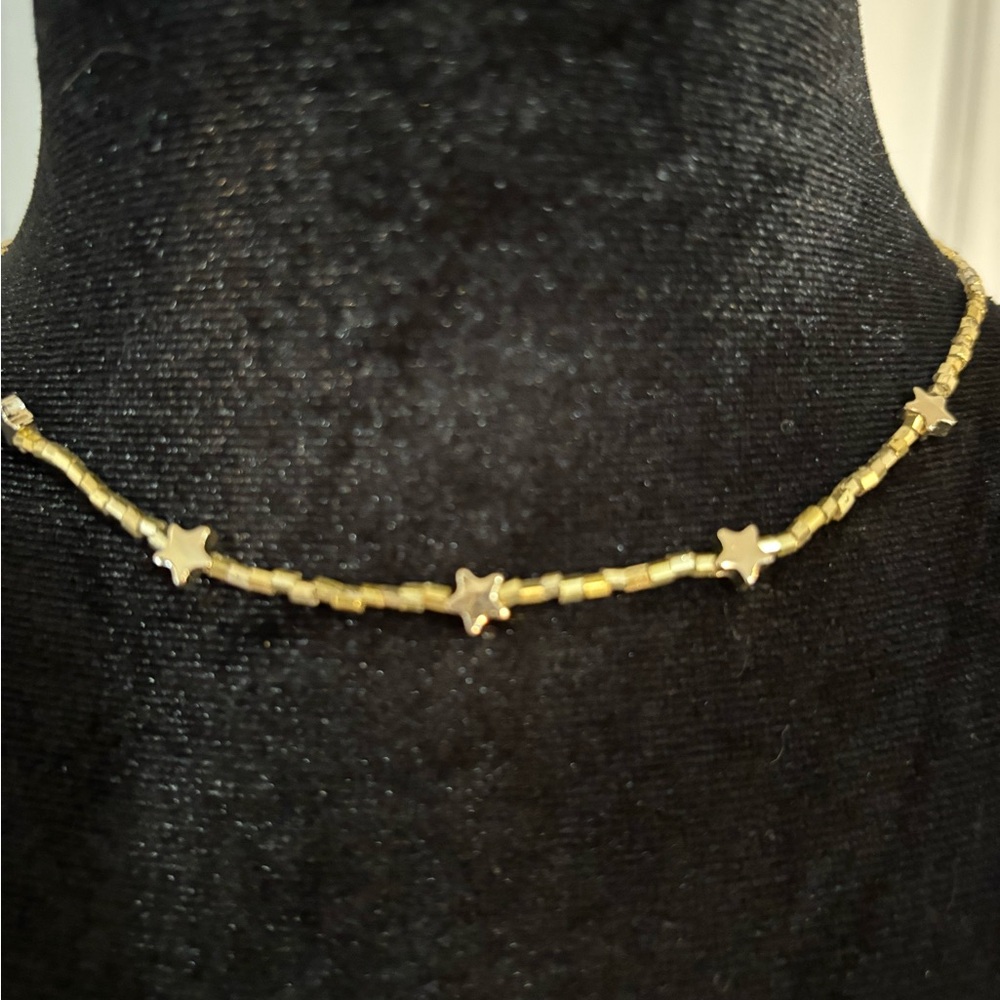 Child’s beaded gold star dainty necklace 14 inches. Kids